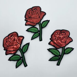 Three red sequin rose patches.