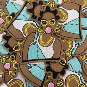 Pattern of women in sunglasses and blue swimsuits blowing bubblegum.