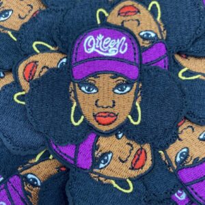 Pattern of stylized female faces wearing purple hats and gold hoop earrings.