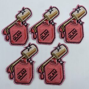 Five embroidered patches of a red hand holding a baseball bat.