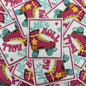 Colorful patches featuring a roller skate and the words 'Let's Roll'.